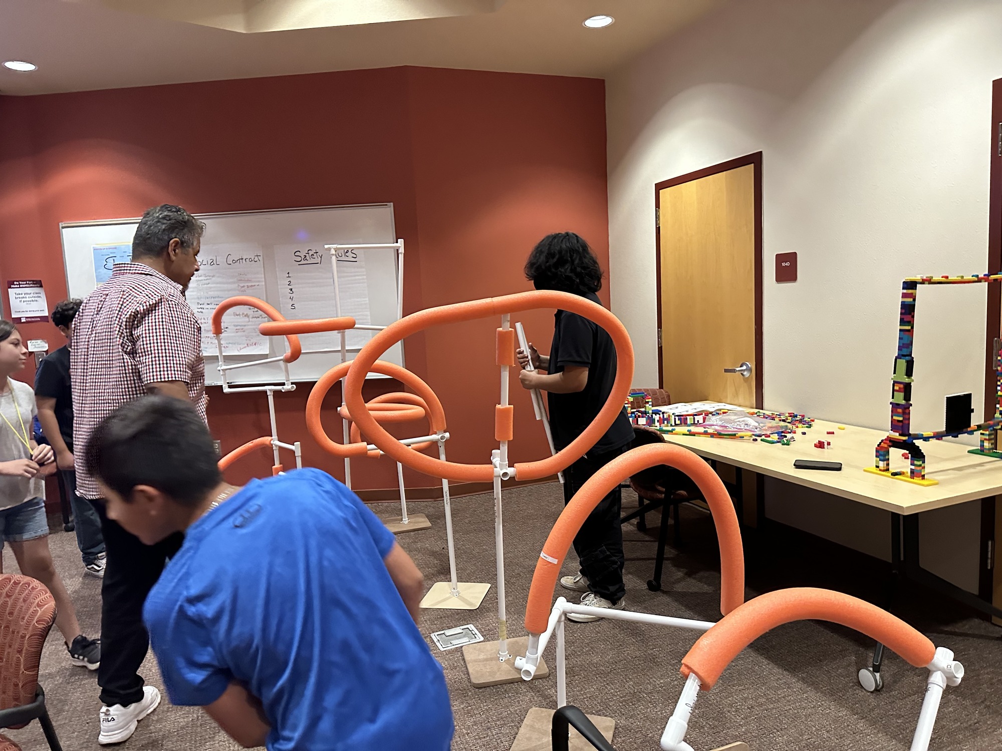 Campers builidng drone obstacle course